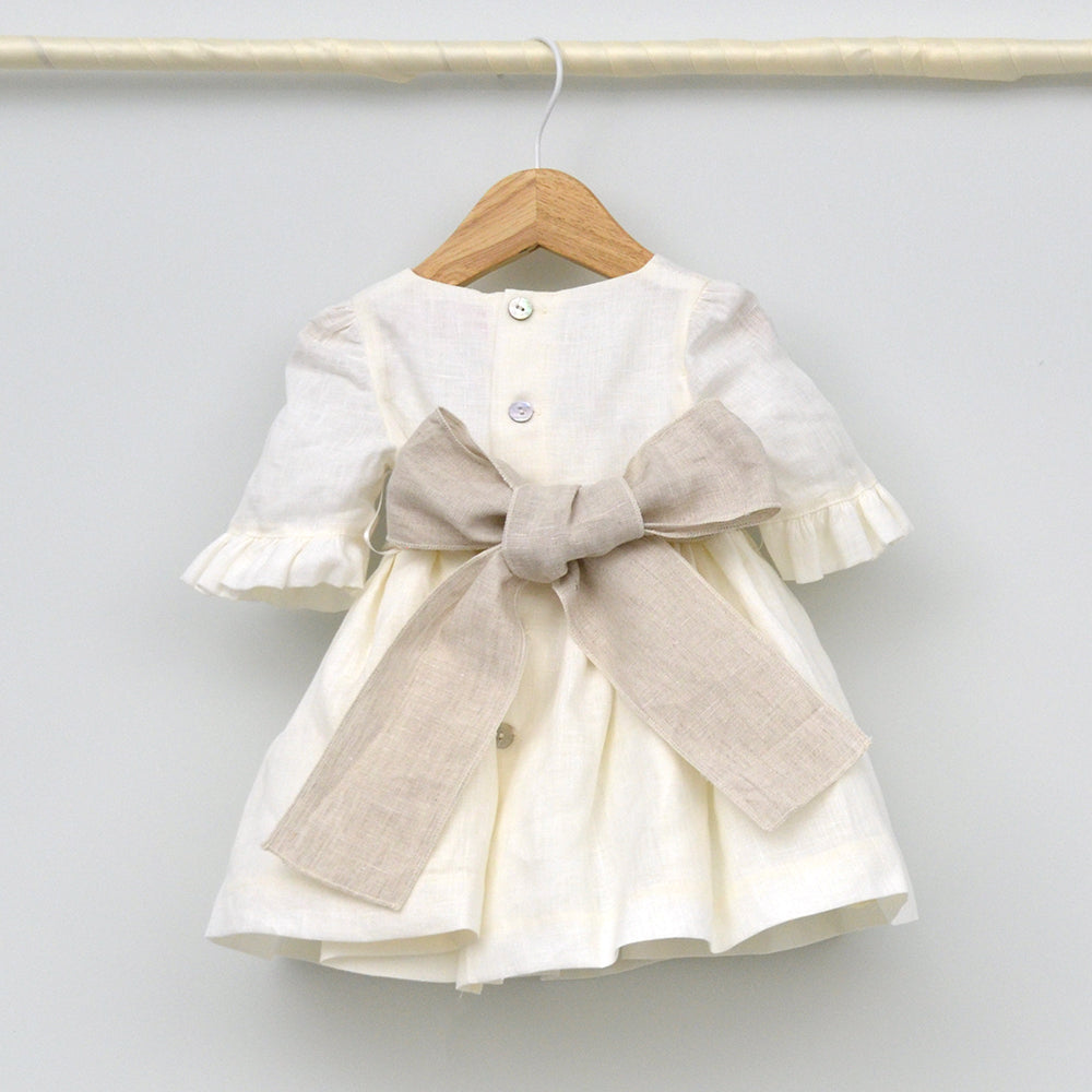 Vestido bebés lino Leo con adorno floral