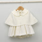capa ceremonia de punto con cuello