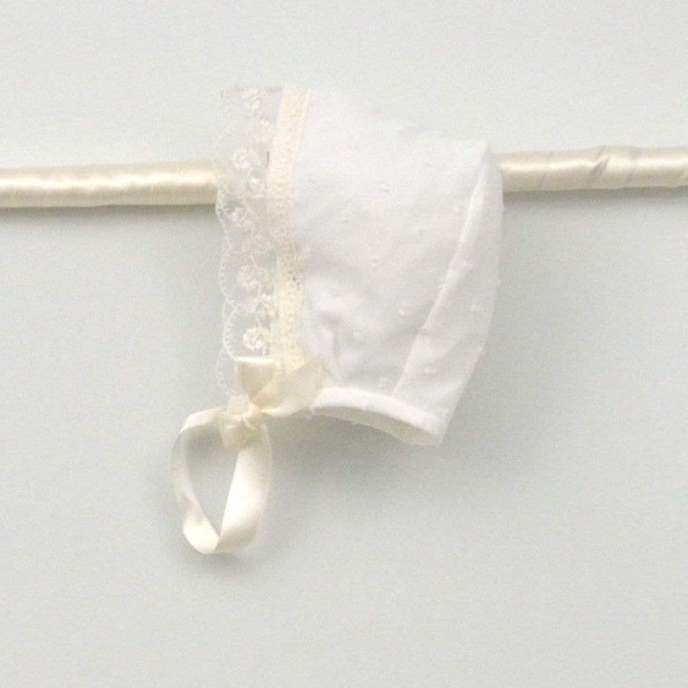 Jesusito Isabel de organza con plumeti con capota y braguita