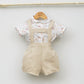 Conjunto bebé Madagascar con peto de lino y camisa cuello bebé