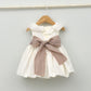 Vestido bebés Emma con fajín de lino y adorno floral
