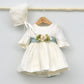 Vestido bebés lino Beatriz con adorno floral