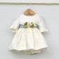 Vestido bebés lino Beatriz con adorno floral