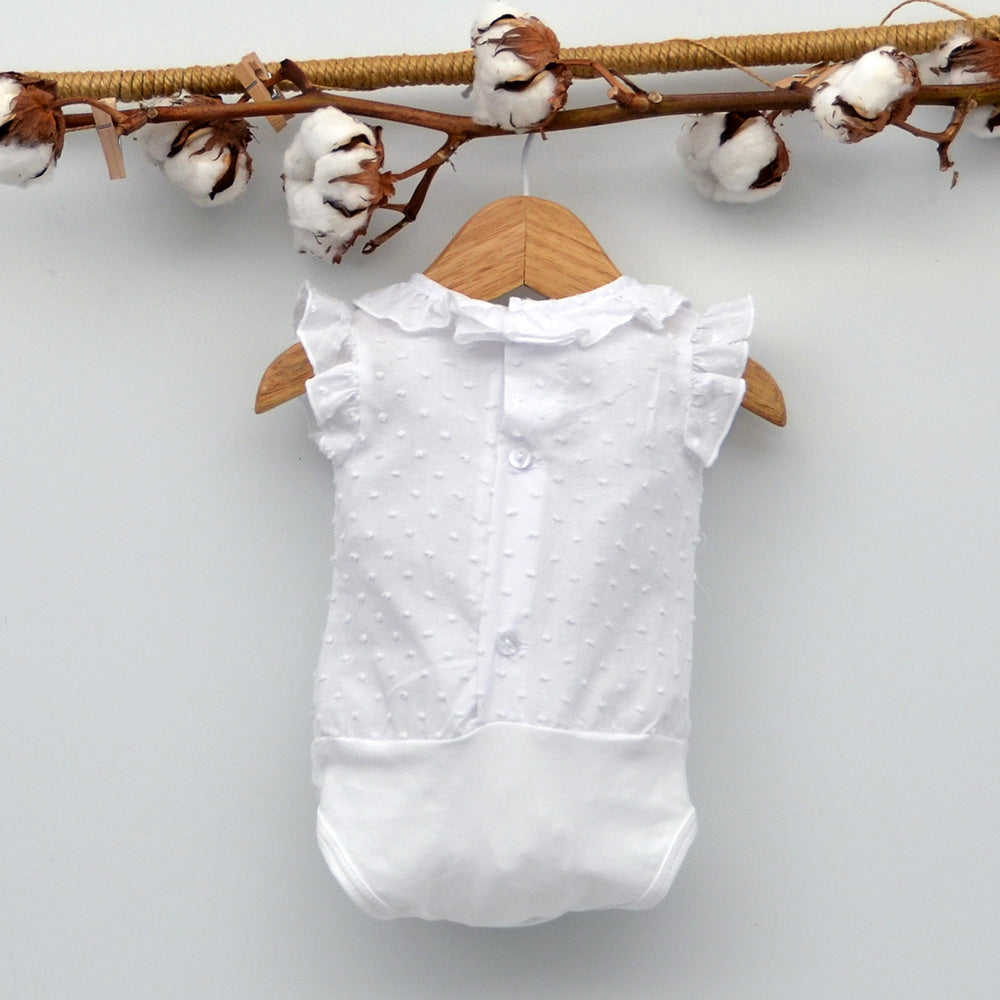 Conjunto de body de bebé para niña y niño recién nacido en perchas